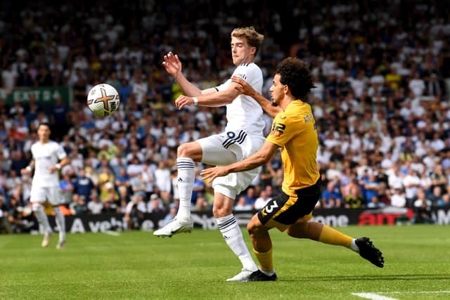 Leeds United's Patrick Bamford  is challenged by Wolves'  Raya Ait-Nouri. Picture: Simon Hulme
