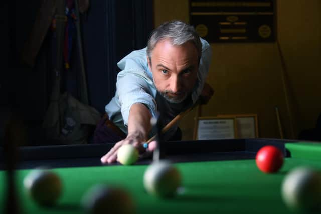 Michael Shallcross playing bar billiards bar billiards. Picture: Jonathan Gawthorpe.