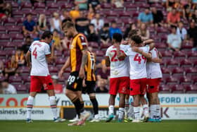 Ozan Tufan celebrates scoring Hull's opening goal at Bradford City in the League Cup.  Picture Bruce Rollinson