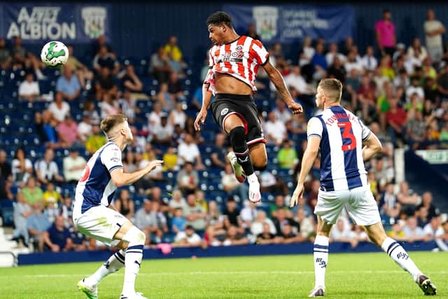 Sheffield United's Rhian Brewster (centre) heads wide of the goal. Picture: David Davies/PA Wire.