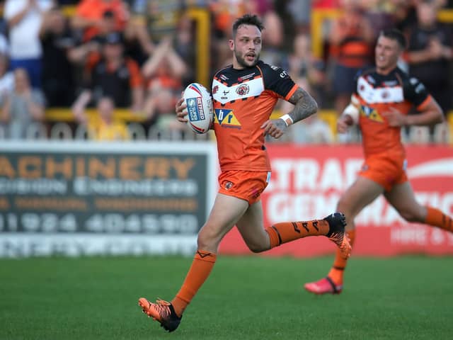 Castleford Tigers' Gareth O'Brien runs in to score his side's first try.