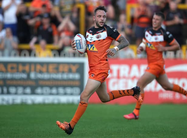 Castleford Tigers' Gareth O'Brien runs in to score his side's first try.