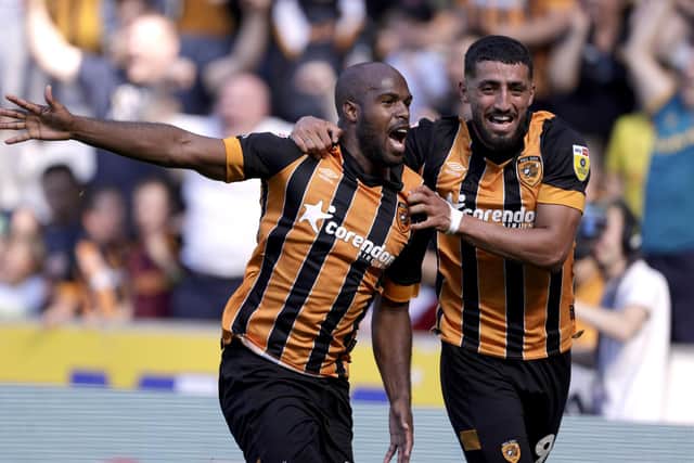 Hull City's Oscar Estupinan celebrates scoring his side's second goal of the game with team-mate Allahyar Sayyadmanesh during the Sky Bet Championship match at the MKM Stadium, Hull. Picture: Richard Sellers/PA Wire.