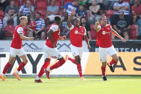 Richard Wood celebrates with his Rotherham United teammates after scoring against Reading. Picture: PA Wire.