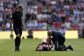 Sunderland's Daniel Ballard receives medical attention during the Sky Bet Championship match at the Stadium of Light. Picture: PA Wire.
