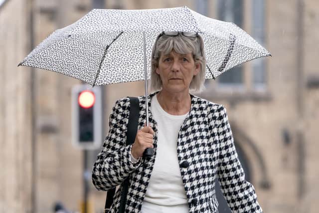 Jane Midgley, mother of victim Simon Midgley, arrives for the fatal accident inquiry