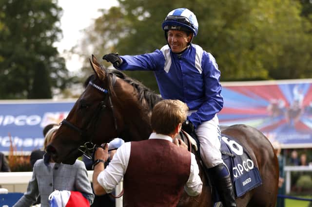 Unbeaten: Jockey Jim Crowley celebrates with Baaeed after winning the Queen Elizabeth II Stakes at Ascot last year - one of nine straight wins for the horse. Picture: Steven Paston/PA