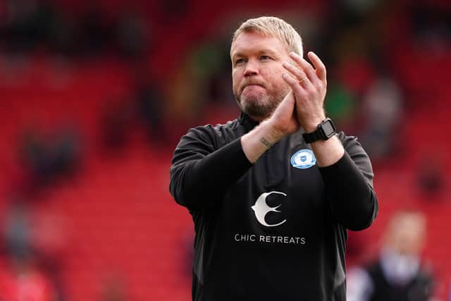 Experienced: Peterborough United manager Grant McCann guided Hull City to promotion from League 1 in 2020. Picture:  Martin Rickett/PA Wire.