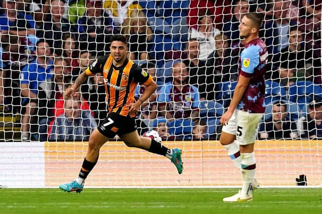 Hull City's Ozan Tufan (left) celebrates scoring in the draw against Hull City (Picture: PA)