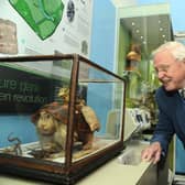 Sir David Attenborough admiring the Waterton Collection during a visit to Wakefield Museum in 2014