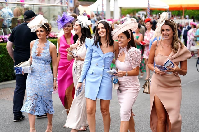 Racegoers arrive during day two of the Ebor Festival at York Racecourse.