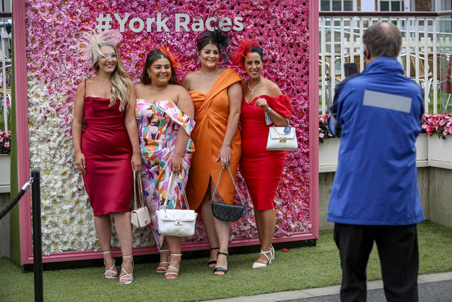 Plenty of people posed for photos in front of the York Races sign
