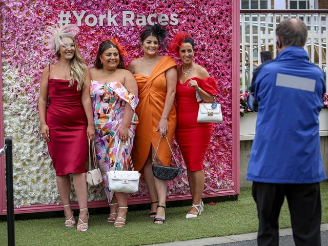 Plenty of people posed for photos in front of the York Races sign