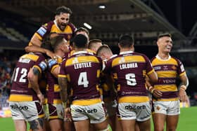 Huddersfield Giants celebrate their sixth try. (Picture: SWPix.com)
