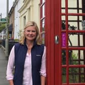 Justine Greening next to the phone box where she found out her A-Level results when she was 18.