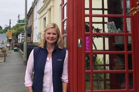 Justine Greening next to the phone box where she found out her A-Level results when she was 18.