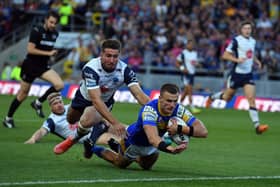 Off we go: Leeds winger Ash Handley scores his side’s first try in last night’s win over Warrington Wolves.Picture: John Rushworth/SWpix.com