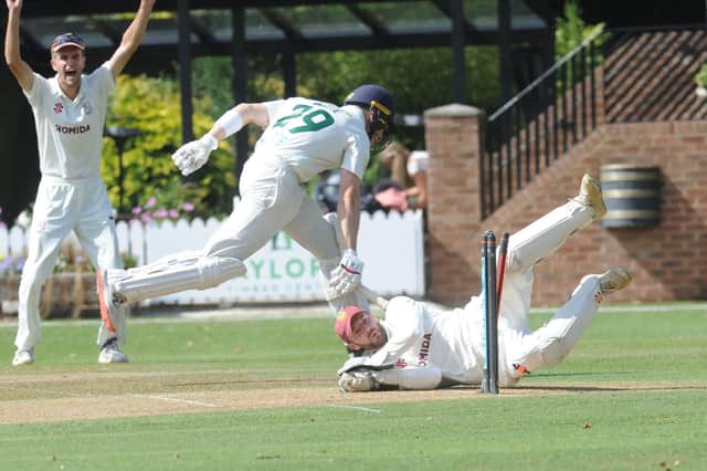CLOSE CALL: New Farnley batter Adam Waite survives a run out from Woodlands wicketkeeper Gregory Finn. Picture: Steve Riding.