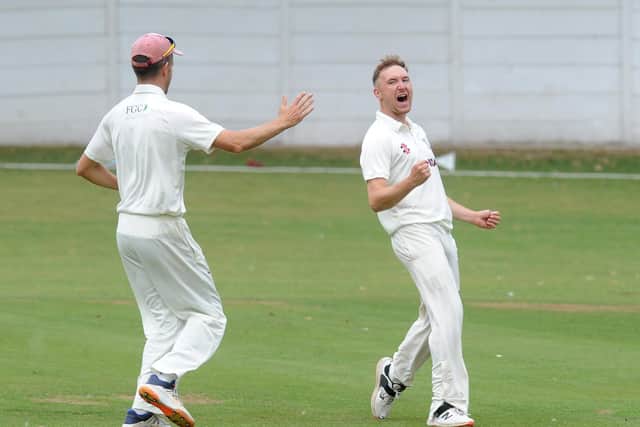 Woodlands bowler Elliot Richardson celebrates after getting the cicket of Aidan Langley for eight, caught by Gregory Finn. Picture: Steve Riding.
