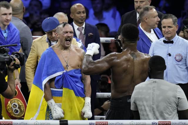 Ukraine's Oleksandr Usyk celebrates after beating Britain's Anthony Joshua to retain his world heavyweight titles at King Abdullah Sports City in Jeddah. Picture: AP/Hassan Ammar