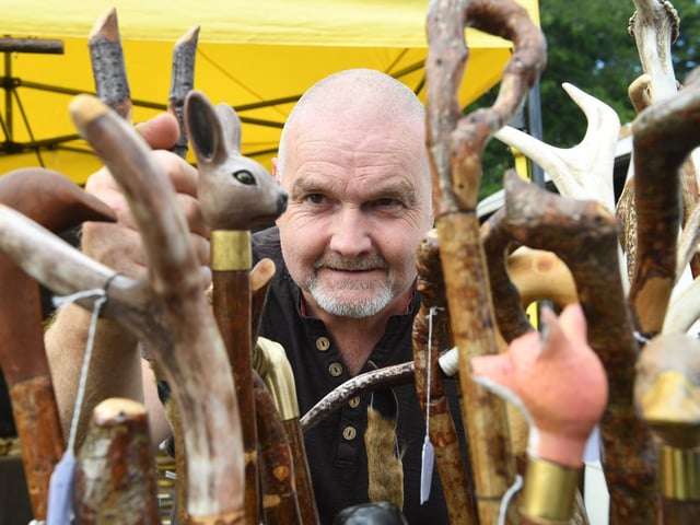 Bernard McMahon with his handmade walking sticks