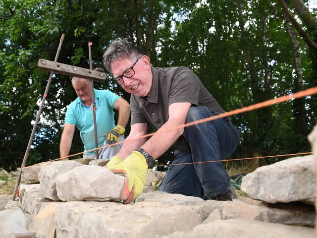 Crawford Smith taking part in the dry stone walling demonstartion