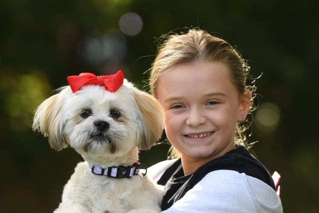 Nine-year-old Heidi Snell with her dog Martha ready for the dog show