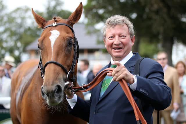 Mark Johnston celebrates becoming the winning-most trainer in British history. Picture: Tim Goode/PA Wire.