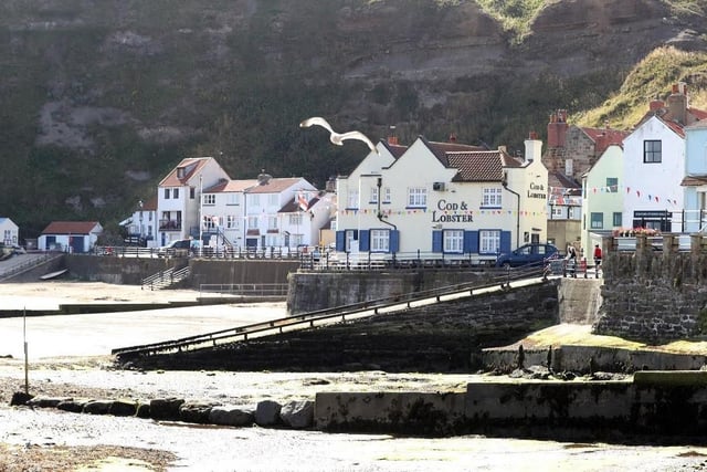 This photogenic fishing village is regarded to be one of the prettiest beaches on the east coast. With its harbour and sandy beachfront, Staithes is where the North York Moors National Park meets the sea. It is a popular spot for fossil hunters and geologists who love to discover the history of the area. The harbour village made an appearance in the CBBC series Old Jack’s Boat, which starred Bernard Cribbins as Old Jack and Salty the dog. Staithes Beach has a rating of four and a half stars on TripAdvisor with 412 reviews.