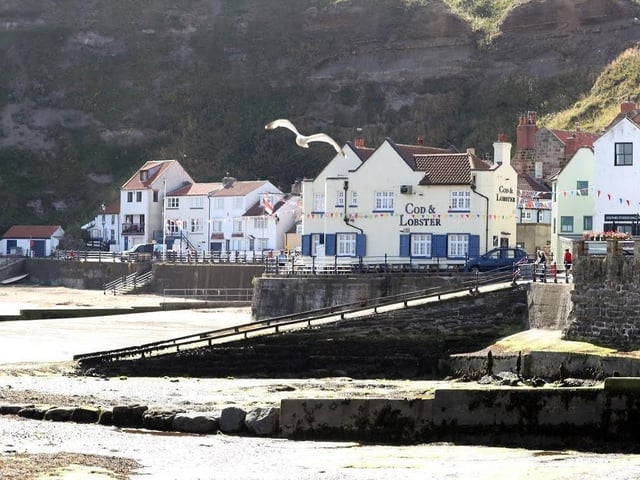 This photogenic fishing village is regarded to be one of the prettiest beaches on the east coast. With its harbour and sandy beachfront, Staithes is where the North York Moors National Park meets the sea. It is a popular spot for fossil hunters and geologists who love to discover the history of the area. The harbour village made an appearance in the CBBC series Old Jack’s Boat, which starred Bernard Cribbins as Old Jack and Salty the dog. Staithes Beach has a rating of four and a half stars on TripAdvisor with 412 reviews.