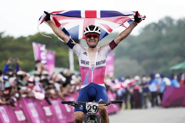 MAGIC MOMENT: Tom Pidcock celebrates after winning the gold medal in the men's cross country mountain biking in Tokyo. Picture: PA