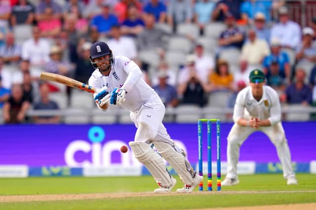 England's Ben Foakes drives through mid-wicket on his way to a century at Old Trafford Picture: Nick Potts/PA
