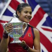 Emma Raducanu holds up the US Open championship trophy after her stunning triumph at Flushing Meadow last year. Picture: AP/Elise Amendola