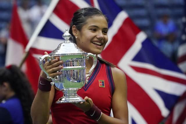 Emma Raducanu holds up the US Open championship trophy after her stunning triumph at Flushing Meadow last year. Picture: AP/Elise Amendola