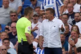 Leeds United manager Jesse Marsch (right) speaks with referee Michael Salisbury (Picture: PA)