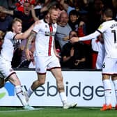 Sheffield United's Oli McBurnie celebrates with teammates after scoring the equaliser at Luton. (Photo by Catherine Ivill/Getty Images)