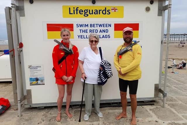 Lifeguard Millie Ellicker, the 74-year-old lady who had fallen, and Senior Lifeguard Tom Davis. She returned to the beach to thank the lifeguards who treated her head injury at Saltburn beach.