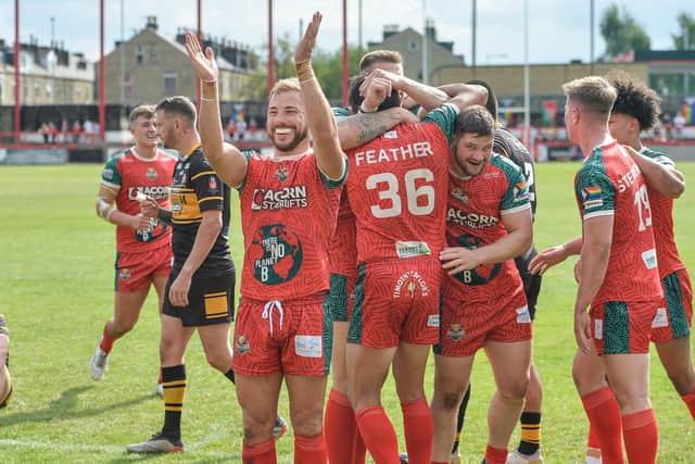 Keighley Cougars celebrate a try in the rout of North Wales Crusaders. (Picture: SWPix.com)