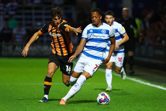Queens Park Rangers' Chris Willock is challenged by Hull City's Ryan Longman at Loftus Road Picture: Andrew Redington/Getty Images