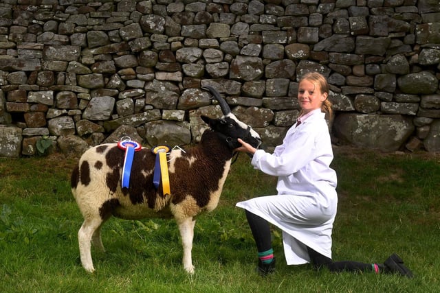 Millie Moore pictured with her Champion Jacob at Reeth Show