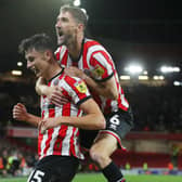 Anel Ahmedhodzic of Sheffield Utd (L) celebrates scoring their fourth goal with Chris Basham during the Sky Bet Championship match at Bramall Lane (Picture: Simon Bellis / Sportimage)