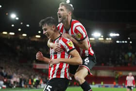 Anel Ahmedhodzic of Sheffield Utd (L) celebrates scoring their fourth goal with Chris Basham during the Sky Bet Championship match at Bramall Lane (Picture: Simon Bellis / Sportimage)