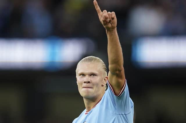 Manchester City's Erling Haaland celebrates after scoring his side's opening goal against Forest (AP Photo/Dave Thompson)