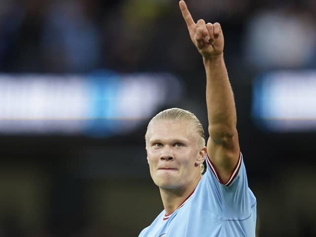 Manchester City's Erling Haaland celebrates after scoring his side's opening goal against Forest (AP Photo/Dave Thompson)