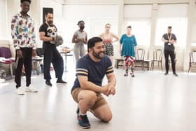 Richard Peralta (Friar) and the Company in rehearsals for Much Ado About Nothing. Photo by Chris Saunders.