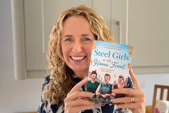 Author Michelle Rawlins with her latest novel Steel Girls on the Home Front.