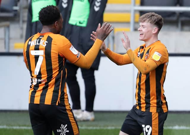 VICTORY: Hull City's Keane Lewis-Potter (right) celebrates scoring Hull's second goal of the game with team-mate Mallik Wilks. Picture: Richard Sellers/PA Wire.