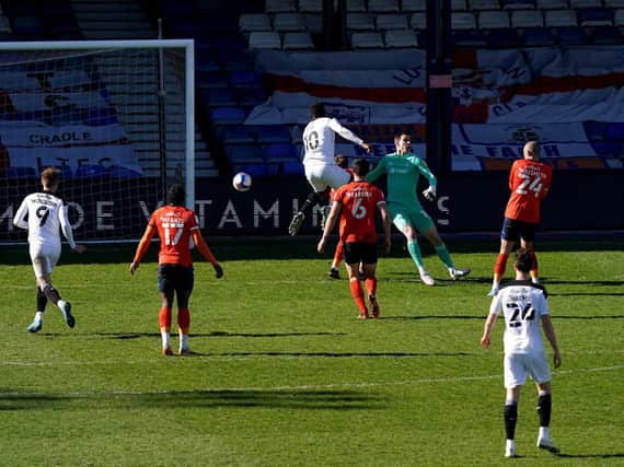 DECISIVE: Daryl Dike pokes home for Barnsley's second goal in their win over Luton Town. Picture: PA Wire.