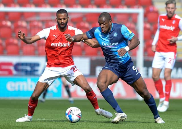 TOUGH GOING: Rotherham United's Michale Ihiekwe tangles with Wycombe's Uche Ikpeazu. Picture: Dean Atkins.
