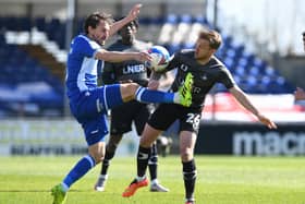 BAD DAY: Doncaster Rovers' James Coppinger tussles with BristolRovers' Ed Upson. Picture Howard Roe/AHPIX LTD,